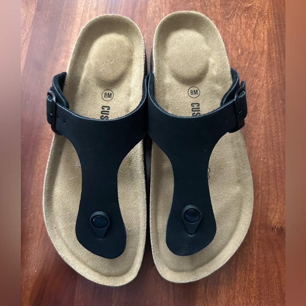 Black and Tan Cushionare thong sandal. NWT